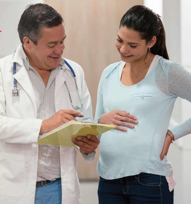 a doctor taking with a pregnant women 