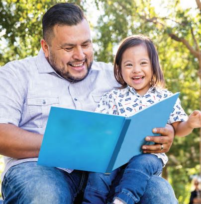 the father reading to his son