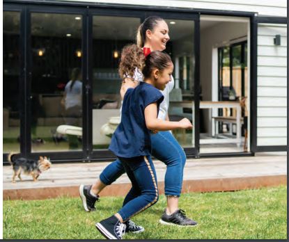 mother and girl running together 