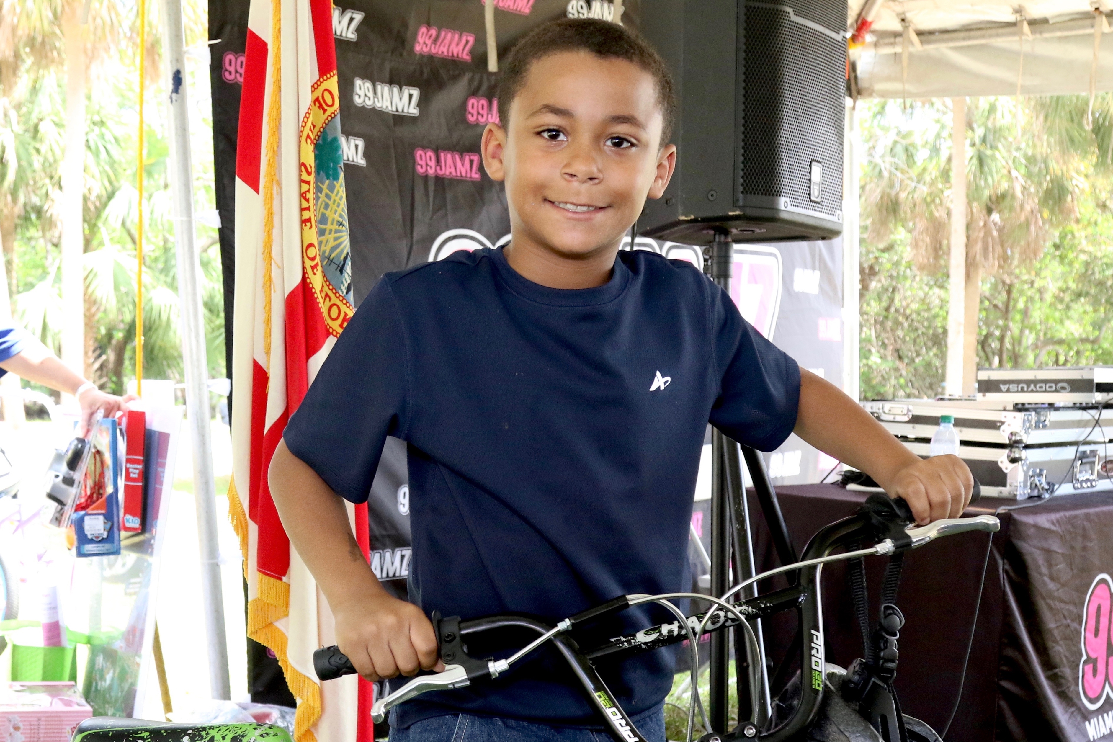 Youth with bike.