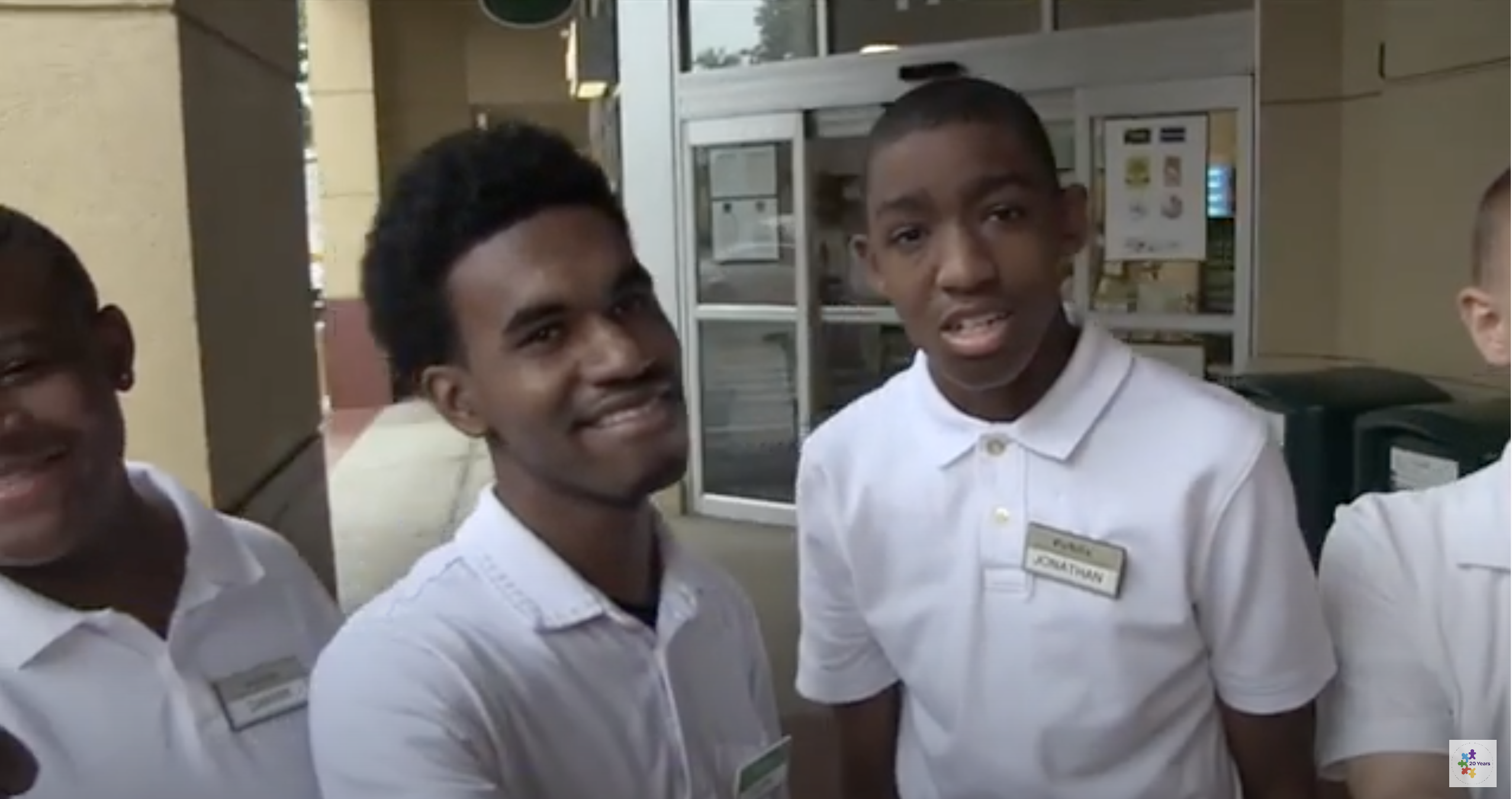 Two youth working at Publix.